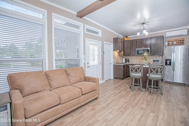 110 Windsong Way, Titusville, FL 32780 - living area with light wood-style flooring, a wall mounted air conditioner, and ornamental molding