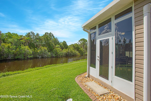 110 Windsong Way, Titusville, FL 32780 - view of grassy yard with a water view