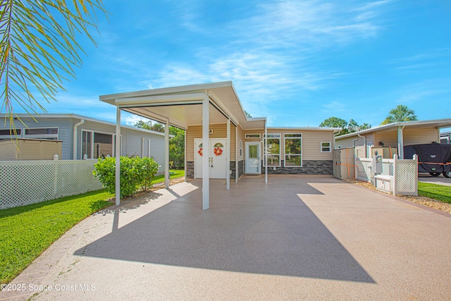 110 Windsong Way, Titusville, FL 32780 - view of patio / terrace with driveway
