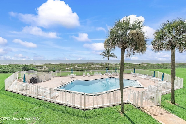 2101 S Atlantic Ave Unit 205, Cocoa Beach, FL 32931 - community pool featuring a patio area