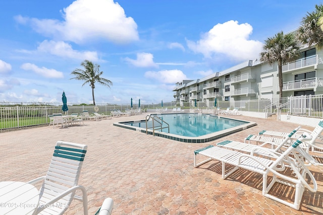 2101 S Atlantic Ave Unit 205, Cocoa Beach, FL 32931 - community pool with a patio area
