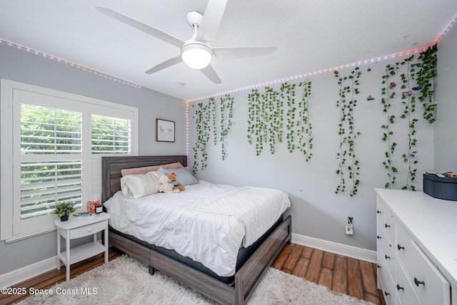 4333 Browning Ln, Rockledge, FL 32955 - bedroom with wood finished floors and ceiling fan