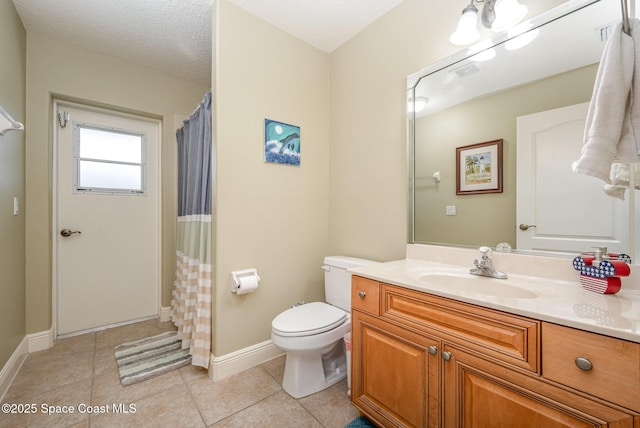 4333 Browning Ln, Rockledge, FL 32955 - bathroom with vanity, tile patterned flooring, curtained shower, and a textured ceiling