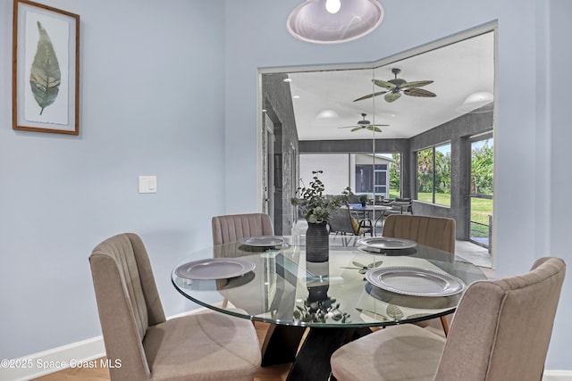 2559 Christopher Dr, Titusville, FL 32780 - dining room with baseboards and a ceiling fan