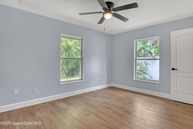 2559 Christopher Dr, Titusville, FL 32780 - spare room featuring light wood-style floors and a ceiling fan