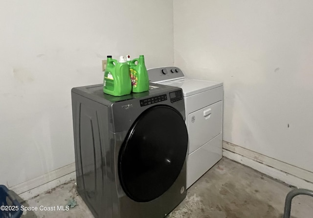 1469 California Dr, Melbourne, FL 32940 - laundry area with washing machine and clothes dryer