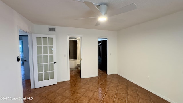 650 N Atlantic Ave Unit 406, Cocoa Beach, FL 32931 - empty room featuring ceiling fan and tile patterned floors