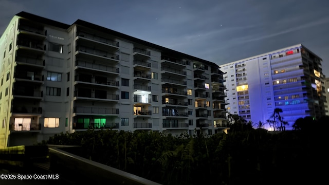 650 N Atlantic Ave Unit 406, Cocoa Beach, FL 32931 - view of apartment building / complex
