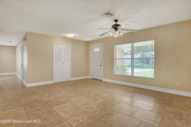 4480 Westview Ln, Titusville, FL 32780 - unfurnished room featuring a ceiling fan and light tile patterned floors