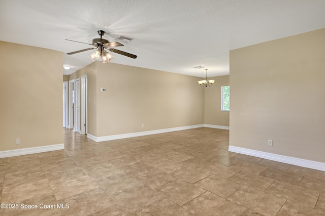 4480 Westview Ln, Titusville, FL 32780 - empty room featuring ceiling fan and a chandelier