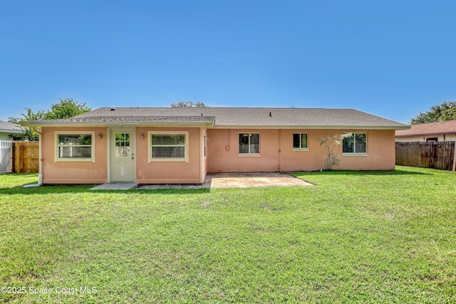 4480 Westview Ln, Titusville, FL 32780 - back of property featuring a patio and stucco siding
