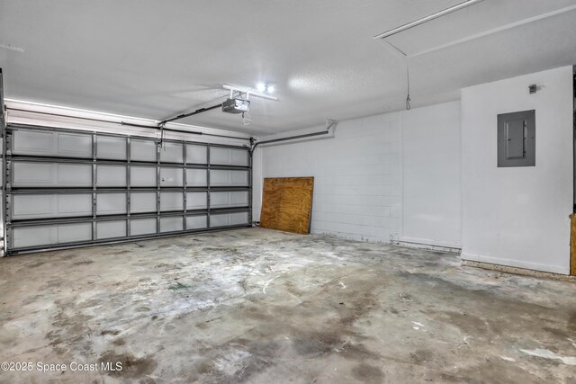 4480 Westview Ln, Titusville, FL 32780 - garage with a garage door opener and electric panel
