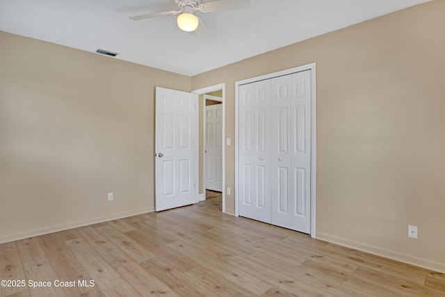 4480 Westview Ln, Titusville, FL 32780 - unfurnished bedroom featuring light wood finished floors, a closet, and a ceiling fan