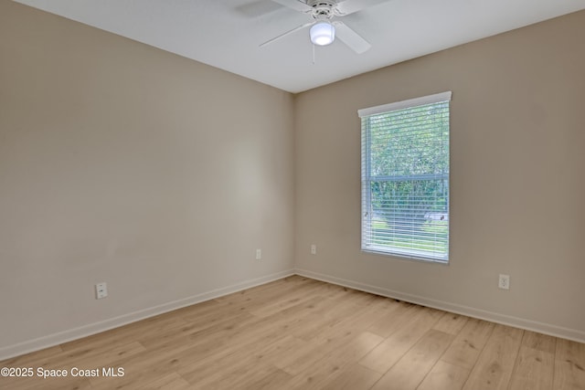 4480 Westview Ln, Titusville, FL 32780 - empty room with light wood-style floors and ceiling fan