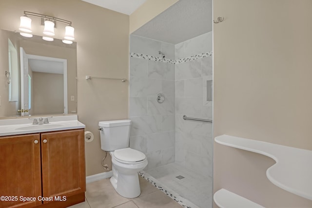 4480 Westview Ln, Titusville, FL 32780 - bathroom with tiled shower, tile patterned floors, and vanity