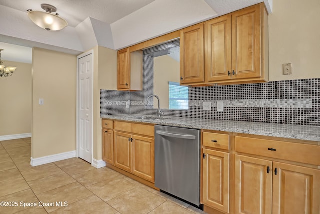 4480 Westview Ln, Titusville, FL 32780 - kitchen featuring stainless steel dishwasher, light stone counters, tasteful backsplash, and light tile patterned floors