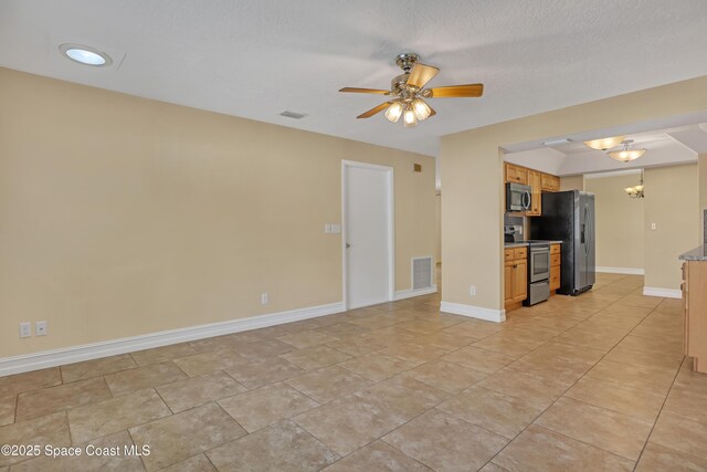 4480 Westview Ln, Titusville, FL 32780 - unfurnished living room with a chandelier, ceiling fan, and light tile patterned flooring
