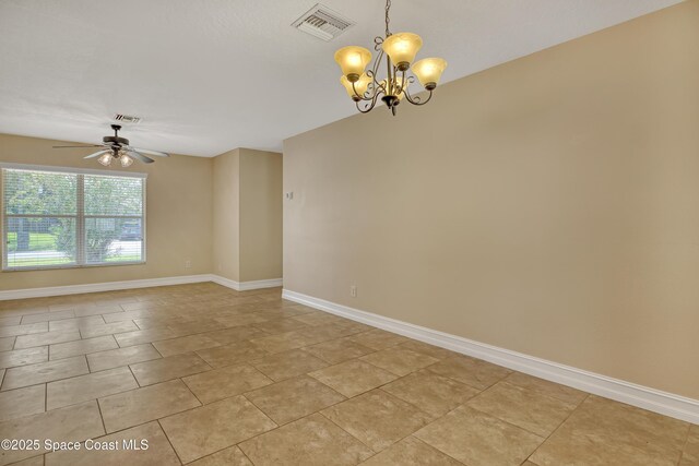 4480 Westview Ln, Titusville, FL 32780 - spare room featuring a ceiling fan and a chandelier