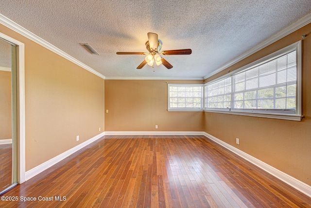 949 Brunswick Ln, Rockledge, FL 32955 - unfurnished room featuring hardwood / wood-style flooring, a ceiling fan, crown molding, and a textured ceiling