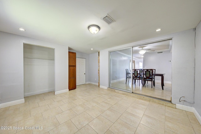 949 Brunswick Ln, Rockledge, FL 32955 - bedroom featuring light tile patterned floors, multiple closets, and recessed lighting