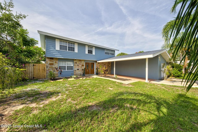 949 Brunswick Ln, Rockledge, FL 32955 - colonial-style house with stone siding
