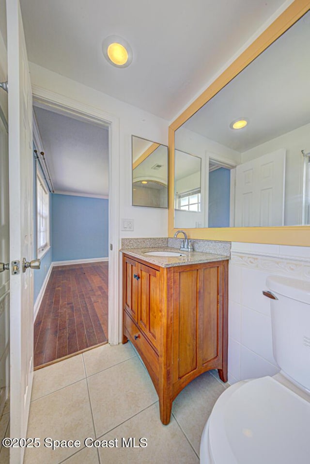 949 Brunswick Ln, Rockledge, FL 32955 - bathroom with vanity, tile patterned flooring, and recessed lighting