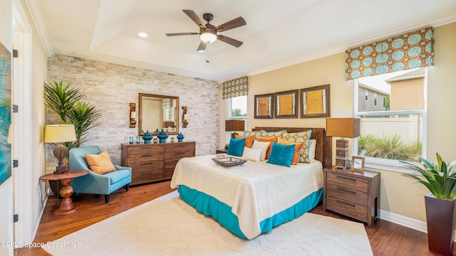 2683 Amati Dr, Kissimmee, FL 34741 - bedroom with a tray ceiling, wood finished floors, recessed lighting, and a ceiling fan