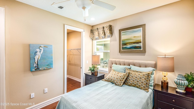 2683 Amati Dr, Kissimmee, FL 34741 - bedroom with wood finished floors and a ceiling fan