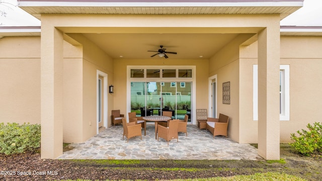 2683 Amati Dr, Kissimmee, FL 34741 - view of patio featuring ceiling fan and outdoor lounge area