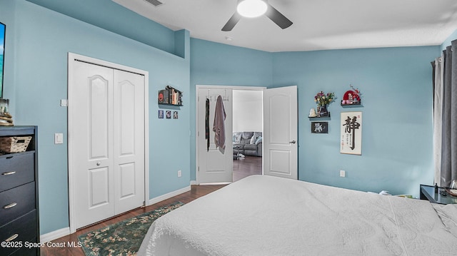 1119 Macon Dr, Titusville, FL 32780 - bedroom with dark wood-style flooring and ceiling fan