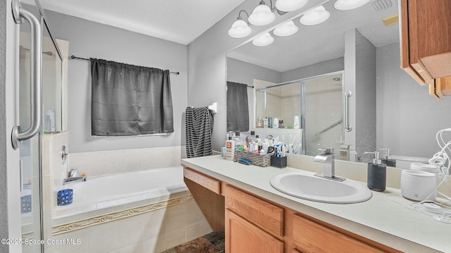 1119 Macon Dr, Titusville, FL 32780 - full bath with vanity, a bath, a shower stall, and tile patterned floors