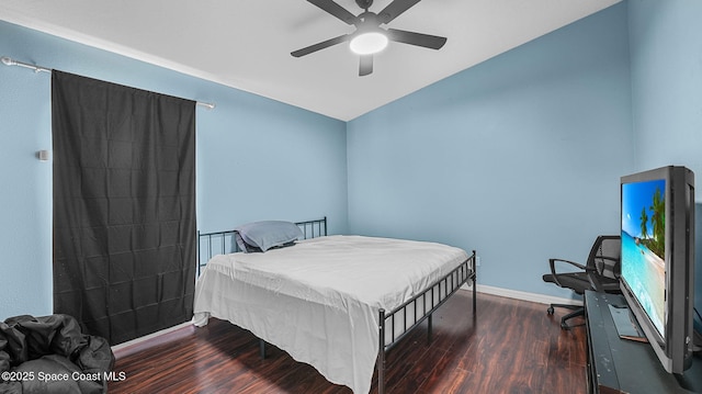1119 Macon Dr, Titusville, FL 32780 - bedroom featuring wood finished floors and ceiling fan
