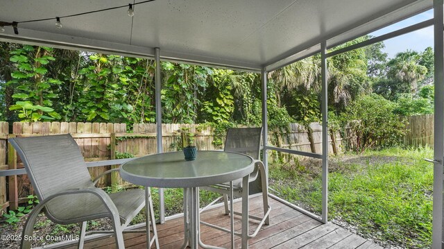 1119 Macon Dr, Titusville, FL 32780 - sunroom / solarium with outdoor dining area