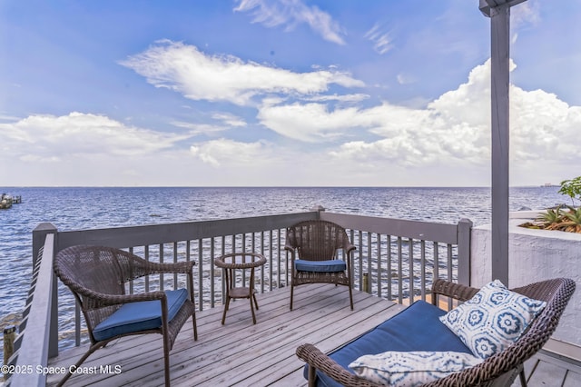 57 Broad St Unit 6, Titusville, FL 32796 - wooden deck featuring a water view