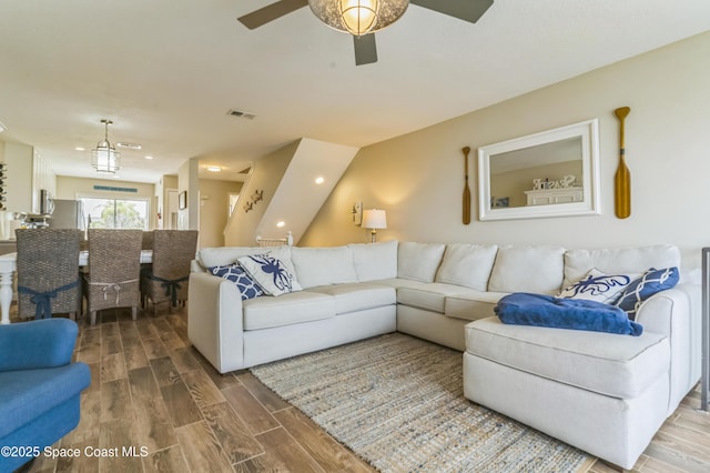 57 Broad St Unit 6, Titusville, FL 32796 - living room with wood finished floors and a ceiling fan