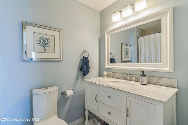 57 Broad St Unit 6, Titusville, FL 32796 - bathroom with vanity and baseboards