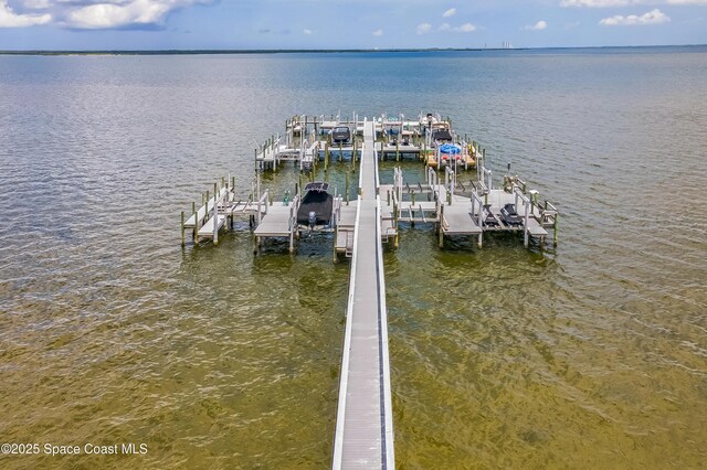 57 Broad St Unit 6, Titusville, FL 32796 - dock with boat lift and a water view
