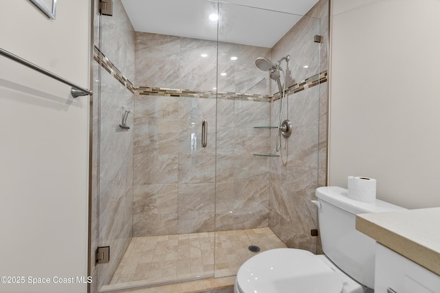 10777 W Sample Rd Unit 1212, Coral Springs, FL 33067 - bathroom featuring a stall shower and vanity