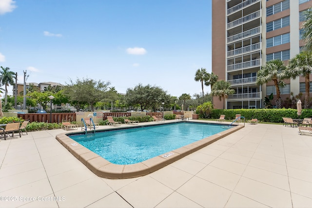 10777 W Sample Rd Unit 1212, Coral Springs, FL 33067 - community pool featuring a patio