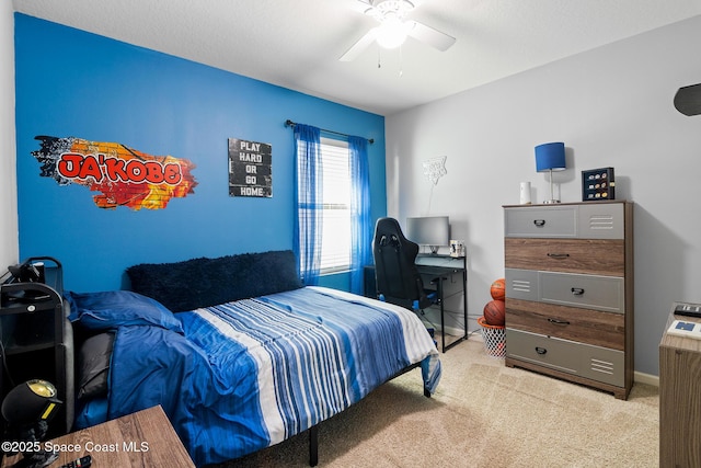 820 Old Country Rd SE, Palm Bay, FL 32909 - bedroom featuring light colored carpet, a desk, and ceiling fan