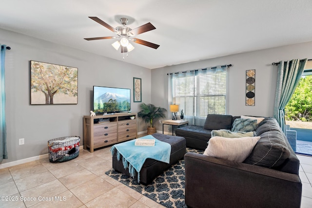 820 Old Country Rd SE, Palm Bay, FL 32909 - living area featuring healthy amount of natural light, light tile patterned floors, and a ceiling fan