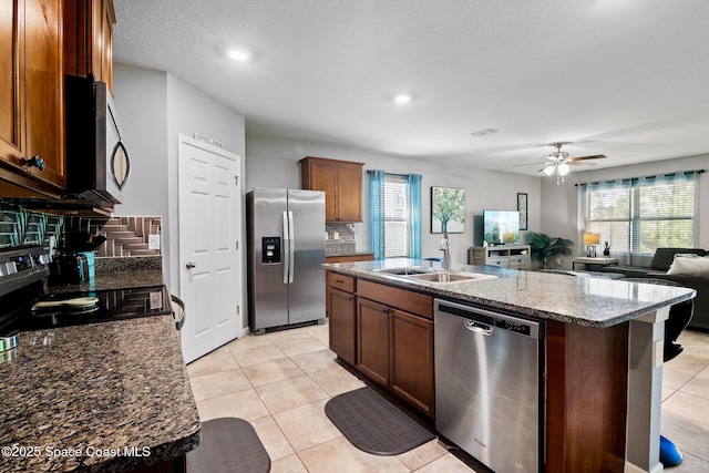 820 Old Country Rd SE, Palm Bay, FL 32909 - kitchen featuring stainless steel appliances, plenty of natural light, a ceiling fan, open floor plan, and recessed lighting