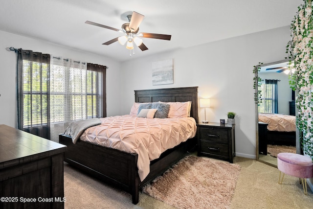 820 Old Country Rd SE, Palm Bay, FL 32909 - bedroom featuring light colored carpet and ceiling fan