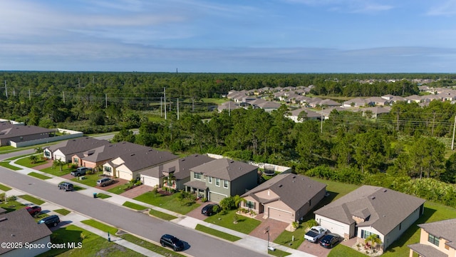 820 Old Country Rd SE, Palm Bay, FL 32909 - aerial perspective of suburban area featuring a heavily wooded area