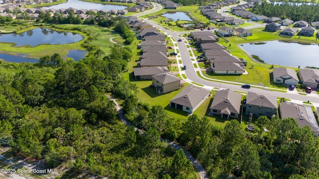 820 Old Country Rd SE, Palm Bay, FL 32909 - aerial perspective of suburban area featuring a large body of water