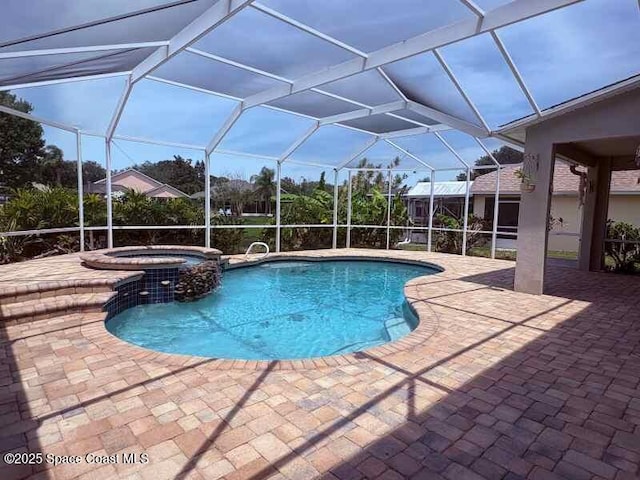 968 Shaw Cir, Melbourne, FL 32940 - view of pool featuring a patio, a pool with connected hot tub, and a lanai