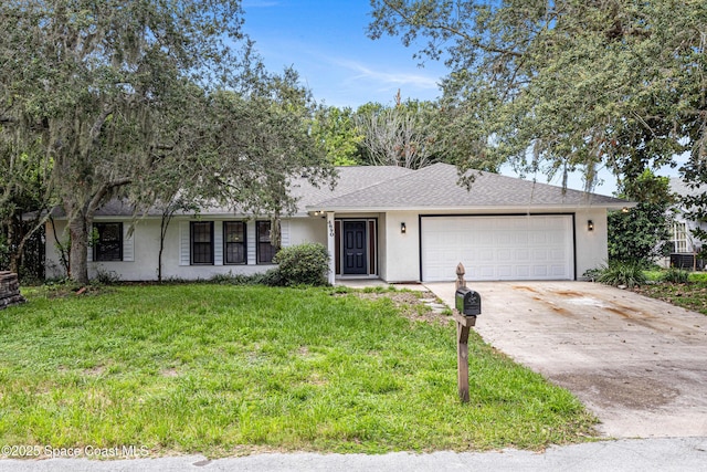 4890 Yew Ct, Titusville, FL 32796 - ranch-style home with stucco siding, driveway, an attached garage, a front lawn, and roof with shingles