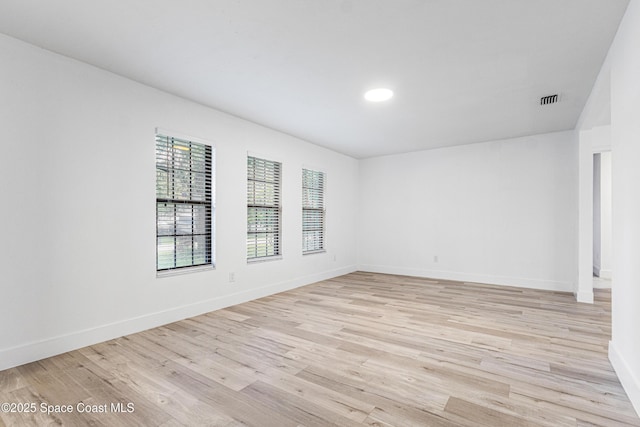 4890 Yew Ct, Titusville, FL 32796 - unfurnished room featuring light wood finished floors and recessed lighting
