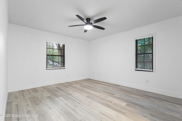 4890 Yew Ct, Titusville, FL 32796 - spare room with light wood-type flooring and a ceiling fan