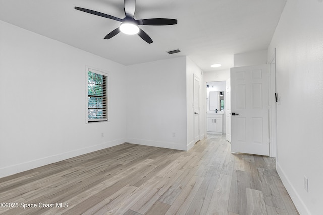 4890 Yew Ct, Titusville, FL 32796 - empty room with light wood finished floors and ceiling fan
